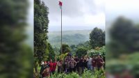 Dipimpin Kapolsek Pakue, Karang Taruna Kibarkan Bendera di Ketinggian 2.422 MDPL